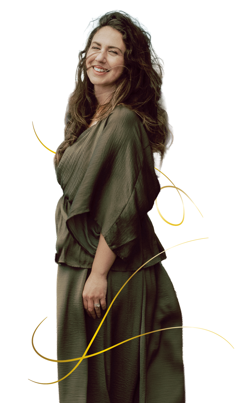 Partial portrait of Ivana wearing a flowing gown with golden line embellishments on a soft white background